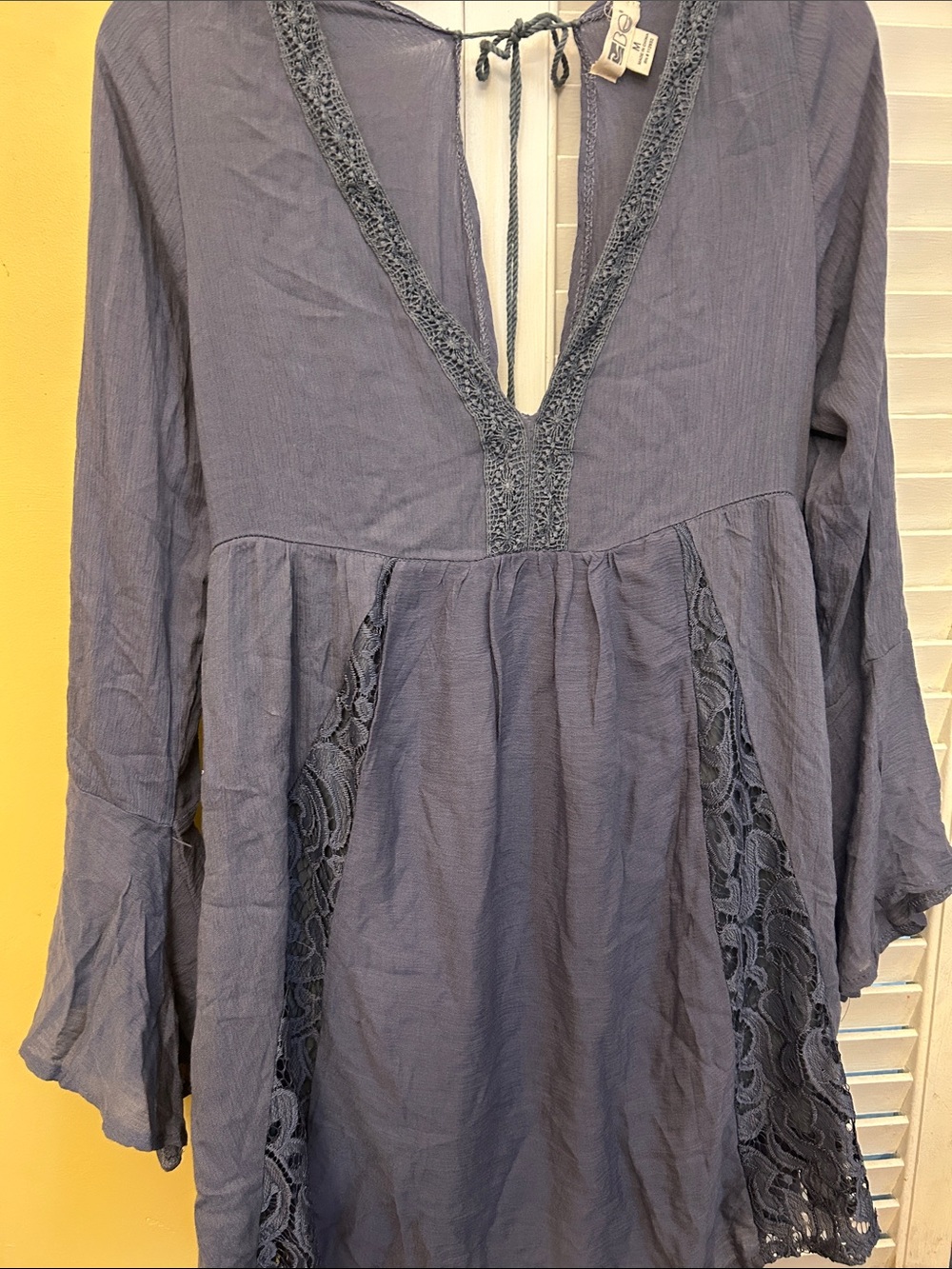 Others Follow Slate Blue Lace-Trim V-Neck Tunic looks vintage